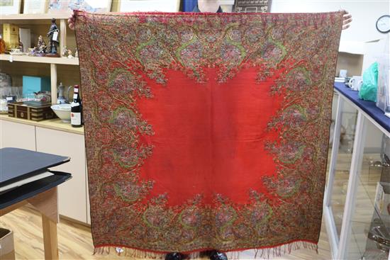 A 19th century Paisley shawl, another small shawl and a block printed Indian cotton cover